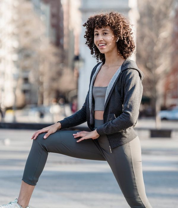 Woman feeling energetic and positive after a morning exercise routine.